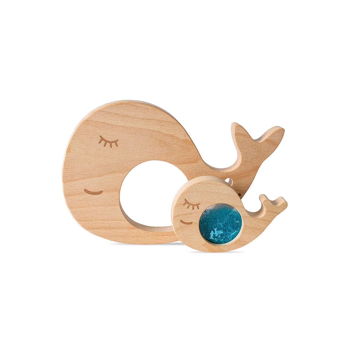 Wooden whale puzzle piece with a circular opening, alongside a smaller baby whale piece containing blue liquid.