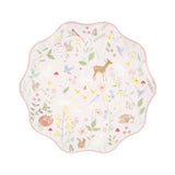 Scalloped paper plate with a pastel woodland animal and floral pattern.