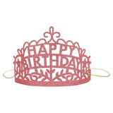 Pink glitter Happy Birthday tiara with intricate cutouts and elastic headband for party celebrations and birthdays.