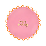 Pink Meri Meri wiggle edge side plate with gold "Happy Birthday" text. Simple, festive paper plate for birthday parties.