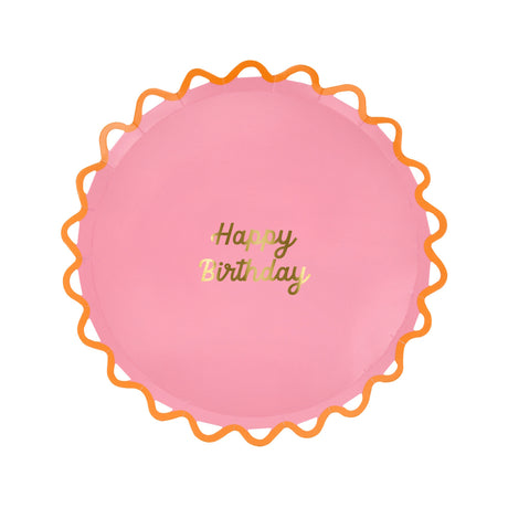 Pink Meri Meri wiggle edge side plate with gold "Happy Birthday" text. Simple, festive paper plate for birthday parties.