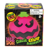 Packaging for NeeDoh Jack-Glow Lantern, showing a pink glow-in-the-dark pumpkin stress ball with a spooky face.