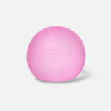 A smooth, solid pink Speks stress ball with embossed brand lettering centered on a white background.