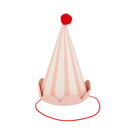 A light pink and white striped party hat with a red pom-pom top and a red elastic string.