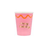Pink paper cup with a gold "Happy Birthday" inscription and an orange wavy line design.