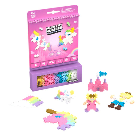Plus-Plus Fairytale Puzzle by Number Activity Pad with 125 pieces and built 2D and 3D unicorn, princess, and castle figures.