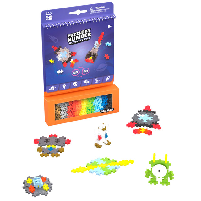 Plus-Plus Puzzle by Number Activity Pad Space set with 125 colorful pieces and 2D and 3D alien and rocket builds.