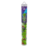 A transparent tube contains Plus-Plus Alien builder pieces in green, red, black, and white. A label depicts an alien with a space-themed background.