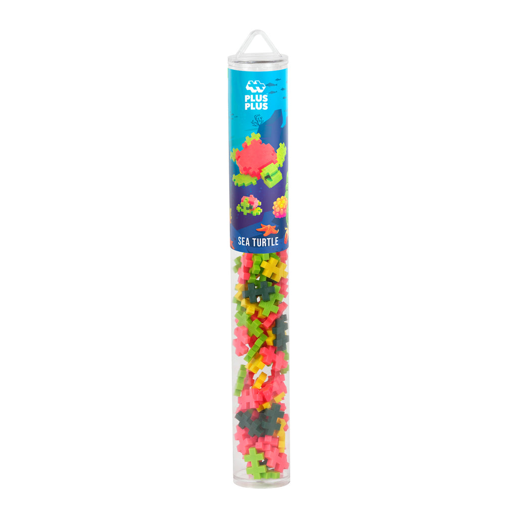 Clear tube containing colorful Plus-Plus building pieces. The label reads "Sea Turtle."
