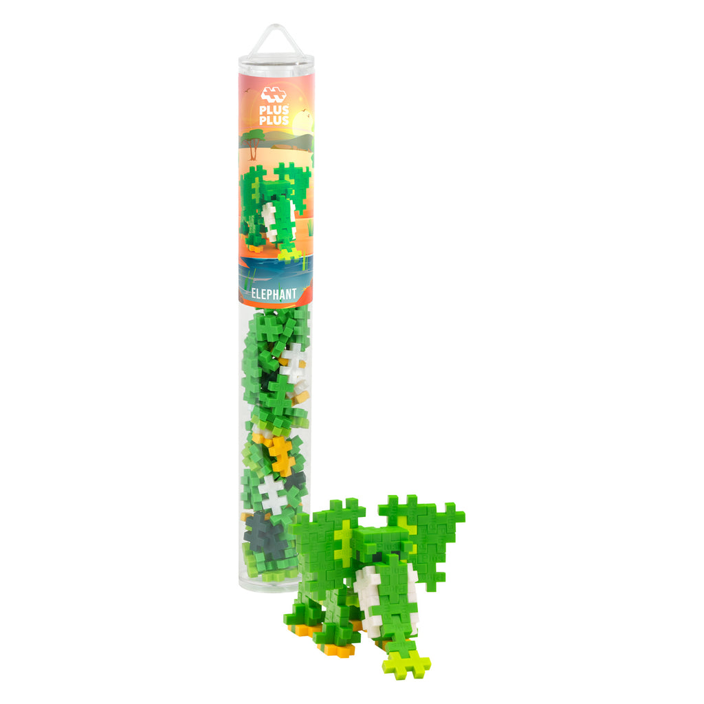 Clear plastic tube containing Plus-Plus building blocks; an assembled green, white, and orange elephant model stands beside it. Playful and creative.