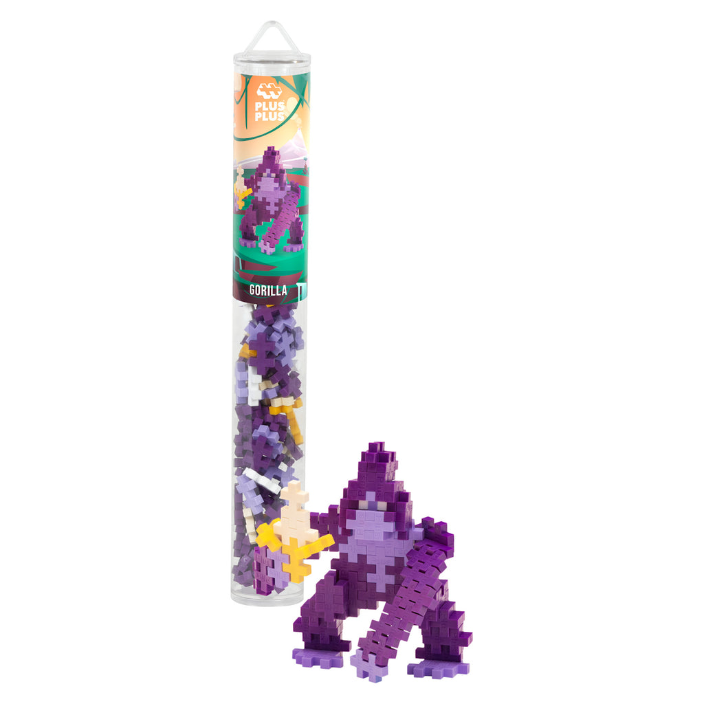 Toy container with colorful Plus-Plus pieces, featuring a purple gorilla figure made from the blocks. Bright and playful design conveys creativity.