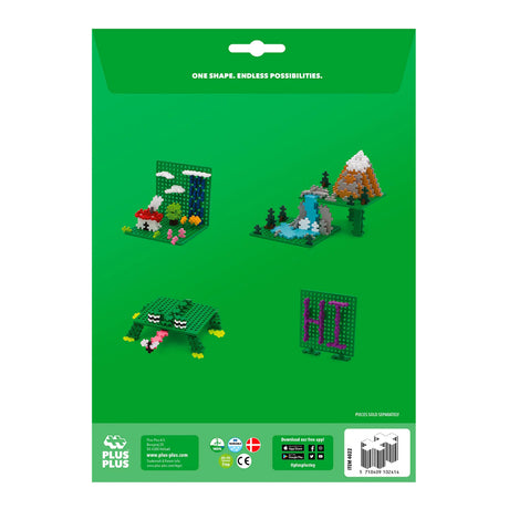 Plus-Plus green baseplate duo packaging showcasing various 2D and 3D builds including a frog, house, and mountain scenery.