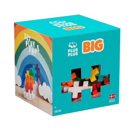 Toy box with colorful interlocking pieces, featuring a rainbow design and text "Set Play Free." The box is turquoise, labeled "Plus Plus Big."