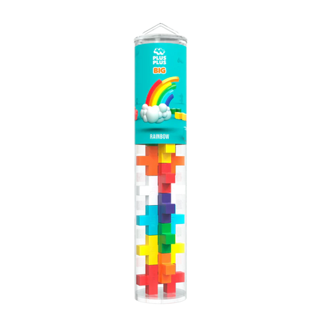 A transparent tube containing colorful, interlocking plus-shaped blocks is labeled "Plus Plus Big" with a cartoon cloud and rainbow on the packaging above.