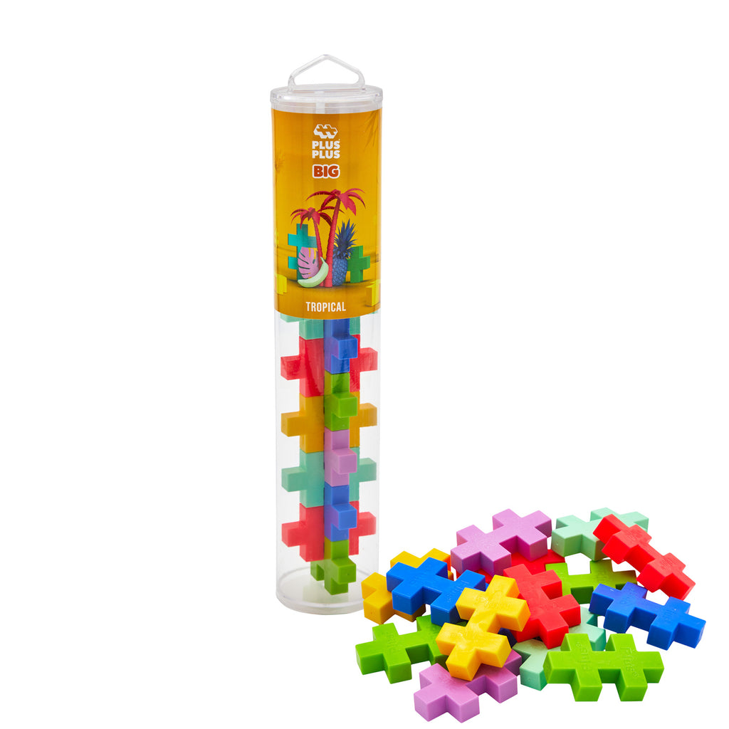 Clear tube containing colorful, plus-shaped building blocks labeled "Tropical." Blocks are spread beside the tube, conveying a playful, creative tone.