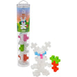 Plus-Plus BIG Bunny tube building set with a white toy bunny holding a carrot made of interlocking blocks.