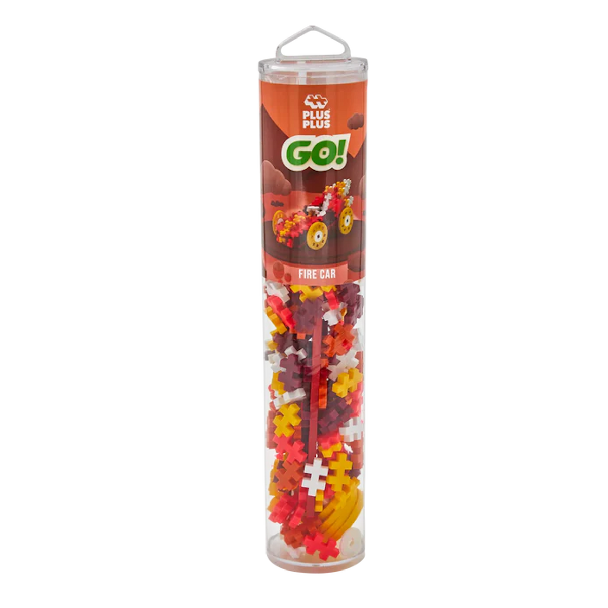 A clear tube labeled "Plus Plus Go! Fire Car" contains colorful interlocking plastic pieces. The packaging shows a model car, suggesting a creative toy.