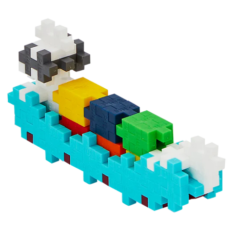 Colorful toy boat made from interconnected cubic pieces. It features blue waves, a multicolored deck, and a black and white structure on a white background.