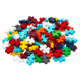 A pile of colorful interlocking plastic puzzle pieces in various shapes, including plus signs, scattered randomly on a white background.