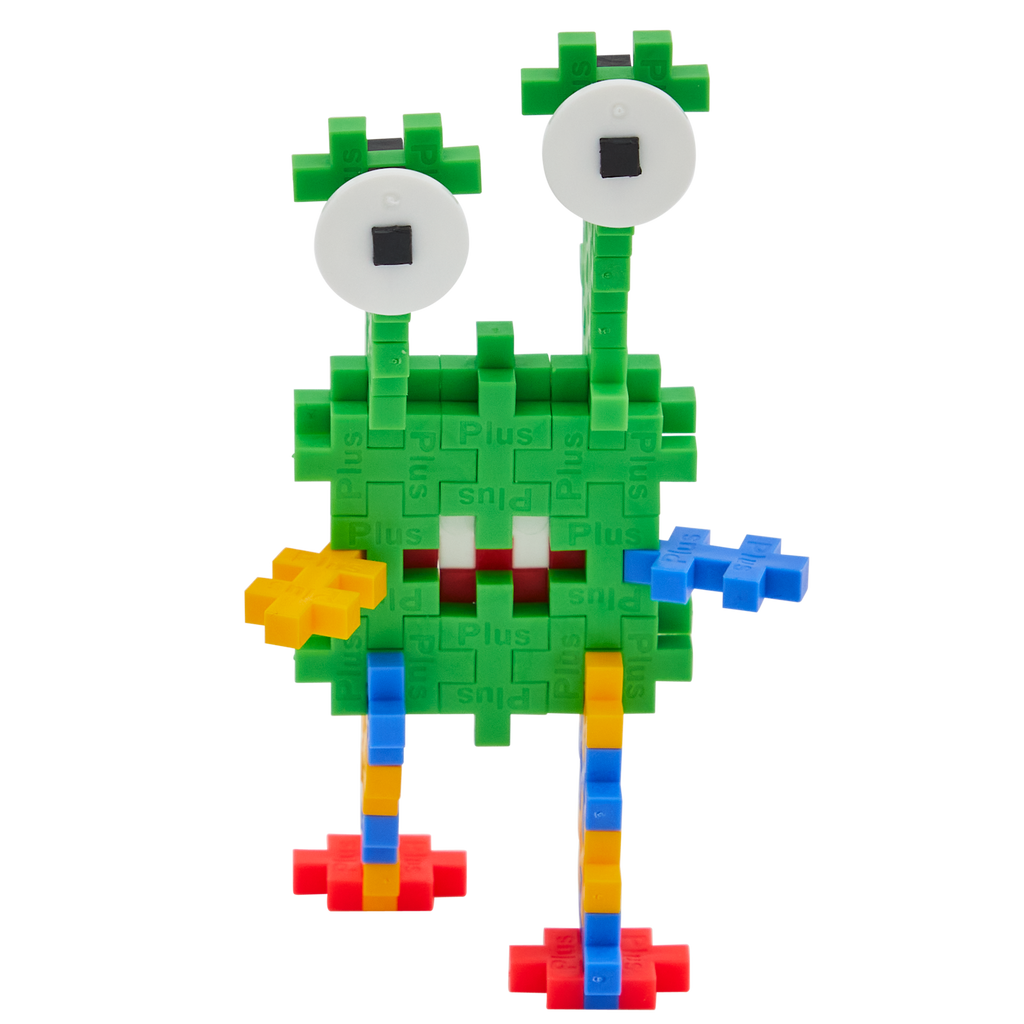 Colorful toy creature made of interlocking blocks with a green body, two large eyes, and multicolored limbs, conveying a playful, whimsical vibe.