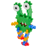 Colorful toy creature made of interlocking blocks with a green body, two large eyes, and multicolored limbs, conveying a playful, whimsical vibe.