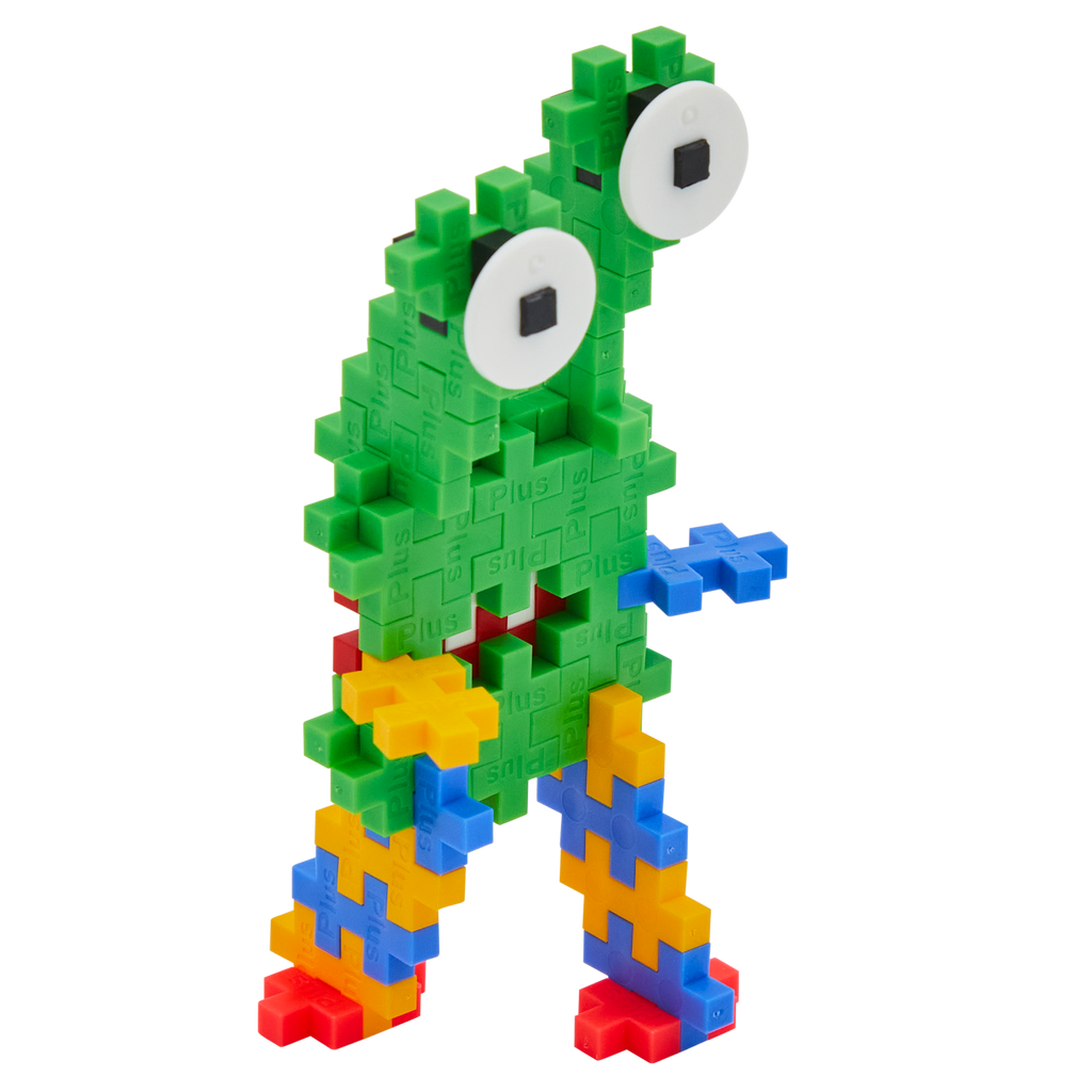 Colorful toy creature made of interlocking blocks with a green body, two large eyes, and multicolored limbs, conveying a playful, whimsical vibe.