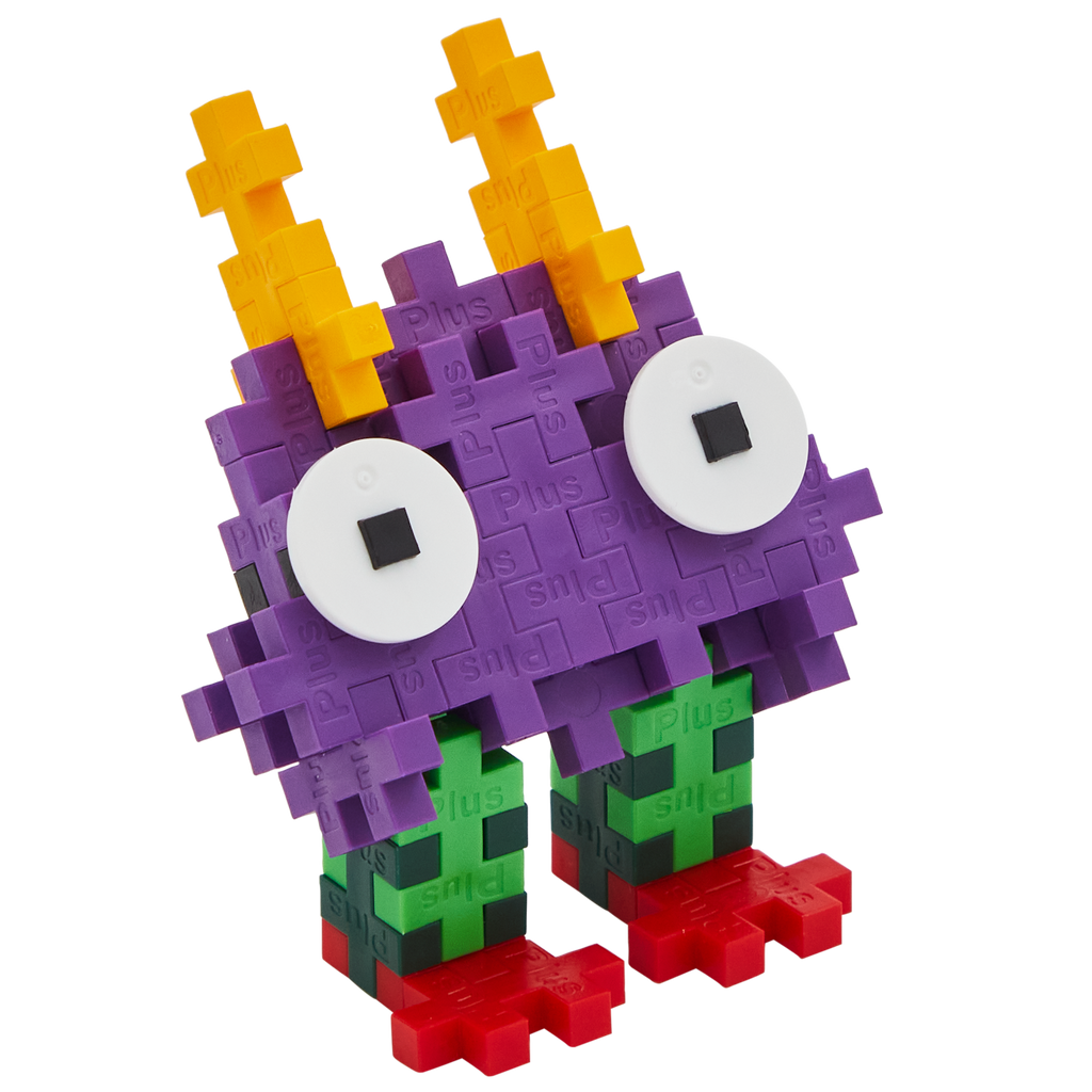A colorful, blocky toy creature made of interlocking pieces on a white background. It has purple body, large white eyes, orange spikes, green legs, and red feet.