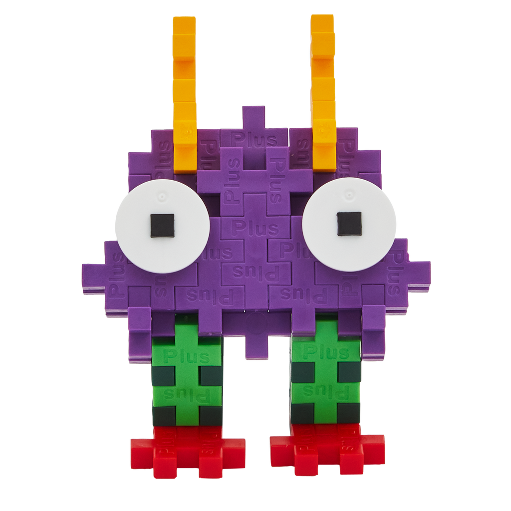 A colorful, blocky toy creature made of interlocking pieces on a white background. It has purple body, large white eyes, orange spikes, green legs, and red feet.