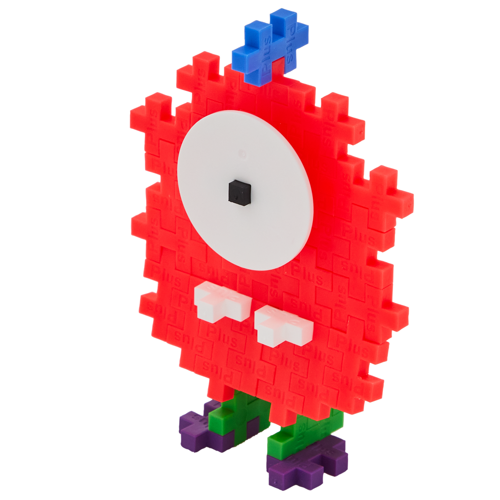 A playful creature made from Plus-Plus building pieces. It has a red pixelated body, large white eye with a black pupil, blue antenna, and green-purple feet.