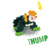 A blocky, frog-like creature made of interlocking pieces on a black background. It features dark green body, bright green feet, and yellow eyes.