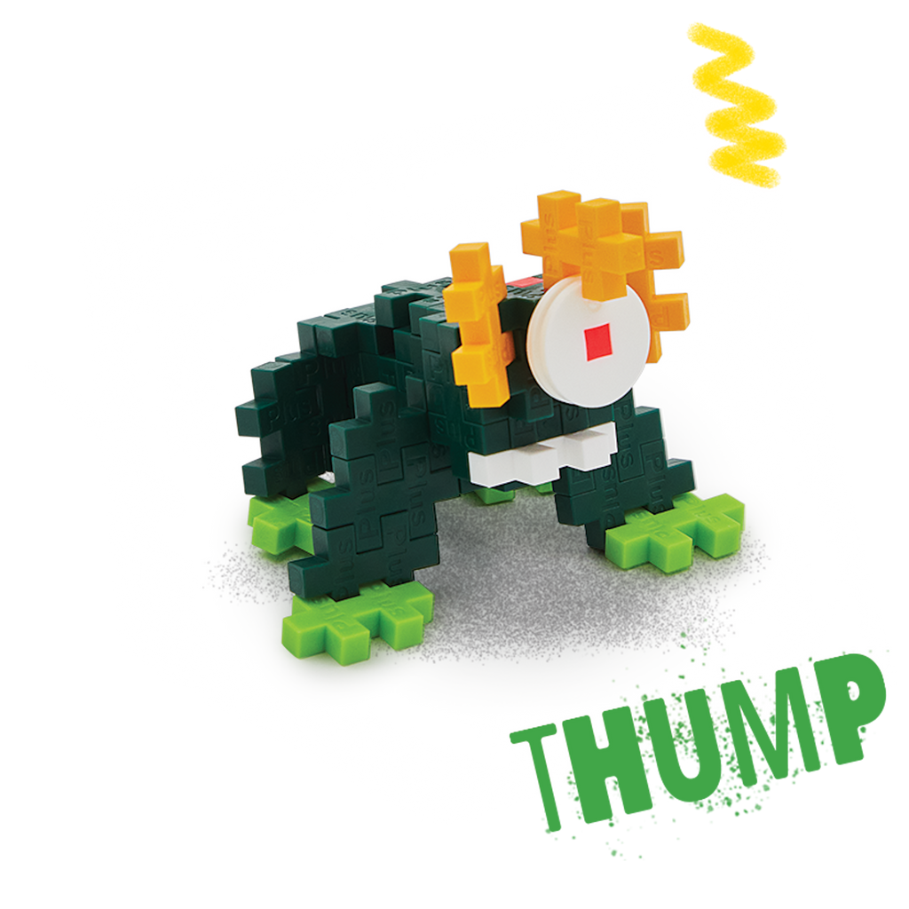 A blocky, frog-like creature made of interlocking pieces on a black background. It features dark green body, bright green feet, and yellow eyes.