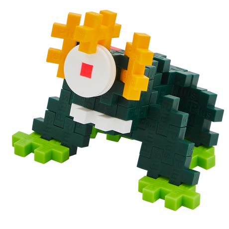 A blocky, frog-like creature made of interlocking pieces on a black background. It features dark green body, bright green feet, and yellow eyes.