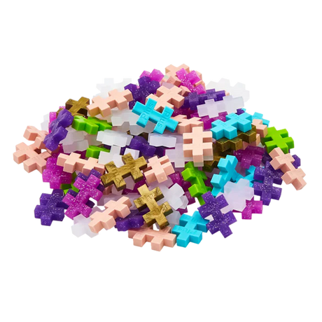 Pile of colorful interlocking puzzle pieces on a white background, featuring shades of pink, blue, purple, green, and gold. The scene feels playful and vibrant.