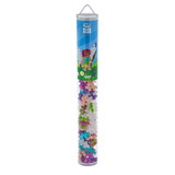 A transparent tube with colorful interlocking Plus-Plus blocks. The label features a playful fairy design with a nature theme and the word "FAIRY."