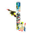 Tube of colorful building blocks labeled "Glow Dragons" with small dragon figures built from the pieces. The blocks are colorful and playful.