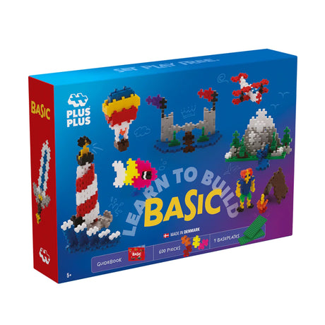 Plus-Plus Learn to Build Basic 600-piece set box showing colorful 3D toy constructions like a lighthouse and castle.