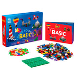 Plus-Plus Learn to Build Basic 600-piece set with building bricks, green baseplates, and instructional guidebook.
