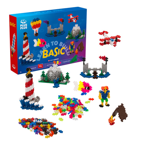 Plus-Plus Learn to Build Basic 600-piece set with toy box, colorful interlocking bricks, and built figures like a lighthouse.