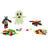 Pixelated ghost, robot, and bat with neon plus-shaped pieces on a white background. Bright colors add a playful, Halloween-themed vibe.