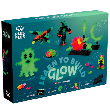 Glow block set packaging featuring colorful, glowing block models like a creature, figure, and structures; labeled "Learn to Build Glow." Made in Denmark.