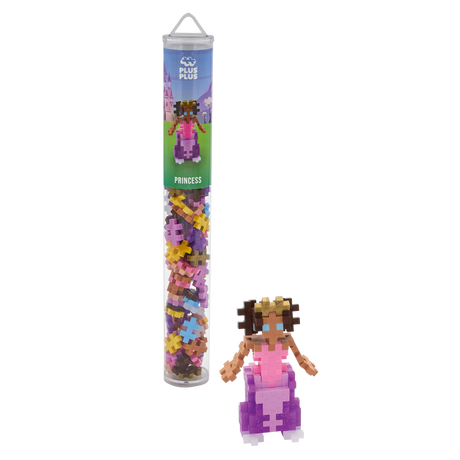 Toy tube labeled "Princess" contains colorful puzzle pieces. The assembled figure beside it is a blocky princess in pink and purple with a crown.