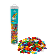 A cylindrical container filled with colorful interlocking puzzle pieces labeled "Rainbow." Pieces are spilled in front, against a white background.