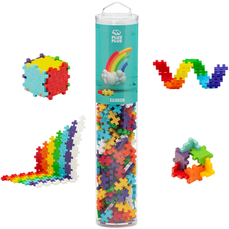 A cylindrical container of Plus-Plus Rainbow educational toy pieces on a white background. Surrounding the container are colorful shapes built from the pieces.
