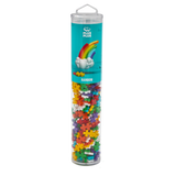 Tall, clear tube of colorful interlocking Plus-Plus pieces labeled "Rainbow," featuring a rainbow with clouds on a teal background, set white black.
