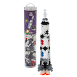 Toy rocket model made from interlocking Plus-Plus pieces in a clear tube with space-themed packaging. The colorful rocket stands upright, exuding creativity.