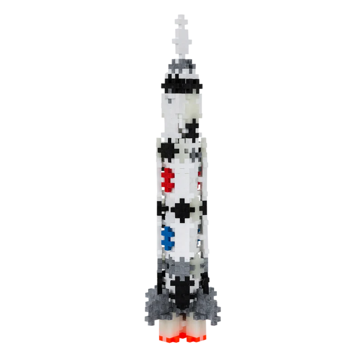 A pixelated rocket made of interlocking blocks features black dots and colorful patterns of red, blue, and gray, against a solid white background.