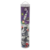 A clear cylindrical container holds Plus-Plus building pieces. The label depicts a rocket titled "Saturn V" against a starry background, suggesting space-themed play.