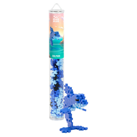 Plus-Plus Dolphin building set with a blue 3D brick dolphin and its clear storage tube packaging.