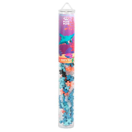 Plus-Plus Manta Ray building set tube with blue, orange, and black interlocking pieces for kids' creative construction.