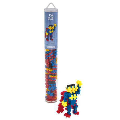 Plus-Plus Superhero tube building set featuring a blue, red, and yellow block figure with a red cape.